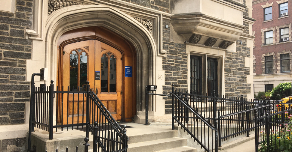 The entrance to 80 Claremont, a gothic revival building with an accessibility ramp to the right of the entrance