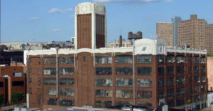 An exterior view of the red brick Studebaker Building