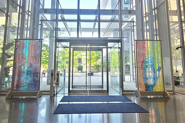 The two colorful custom pieces on display in the JLG Science Center lobby on either side of the entry way.  